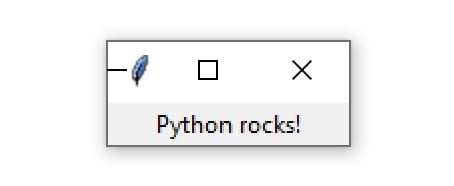 A Tkinter window containing the text "Python rocks!"